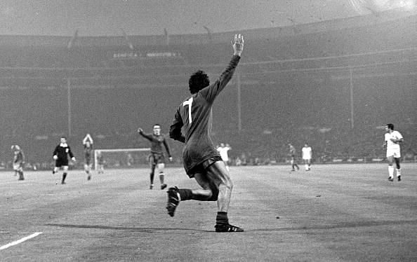 George Best celebrates after scoring his side's second goal to give them the lead in extra time.